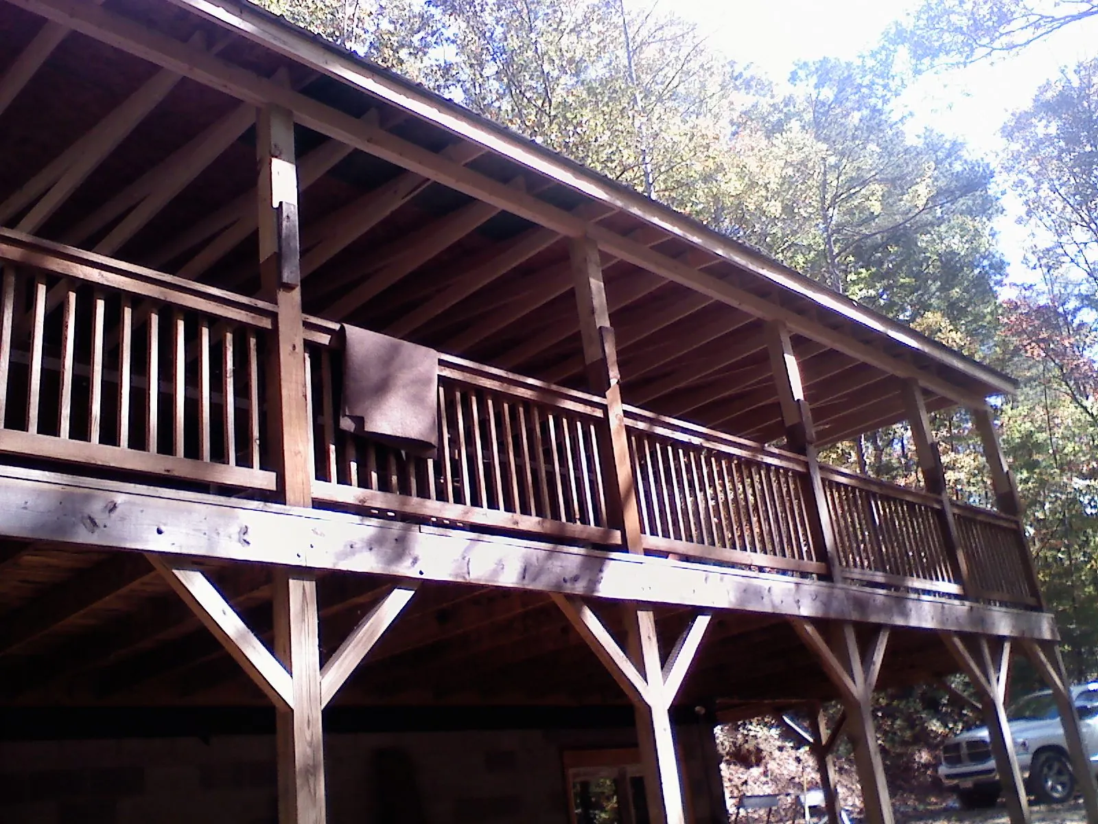 Timber framing under a new elevated porch and deck — Roof Leak Repair in Bettendorf by Roofing Brothers